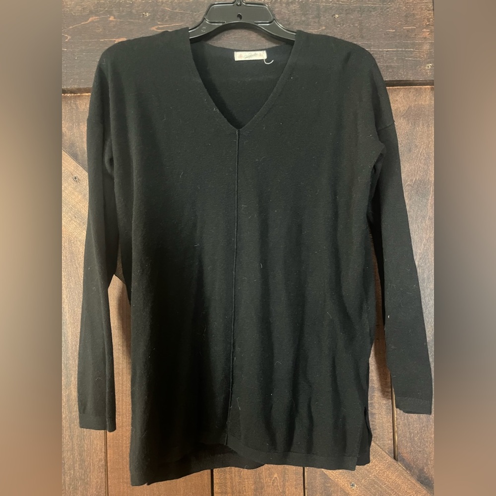Black sweater, unsure on size, M or L